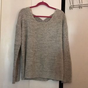 Gray sweater w. cross-crossed back good condition